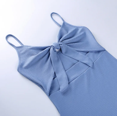 Urbanhaloo V-neck split maxi beach dress featuring flowing fabric and a stylish V-neck design, perfect for summer beach outings.