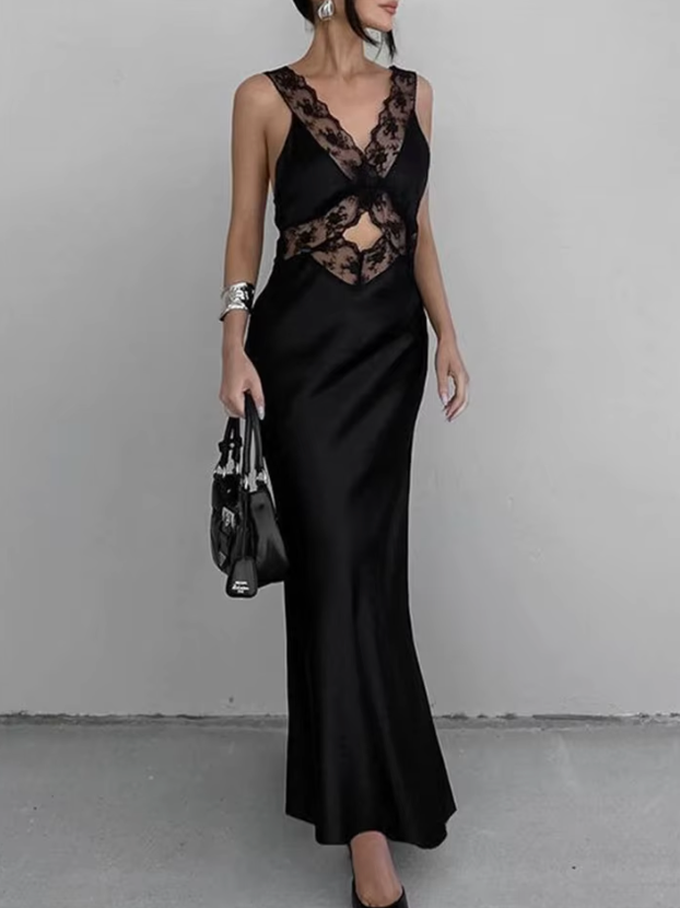 Urbanhaloo Luxe Lace Splice Maxi Dress displayed on a hanger, featuring intricate lace detailing and flowing fabric in elegant style.