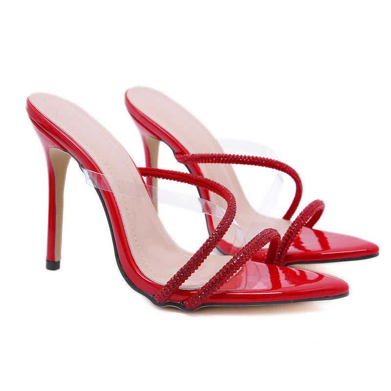Pointed toe rhinestone super high heel sandals with a sleek design and sparkling embellishments.