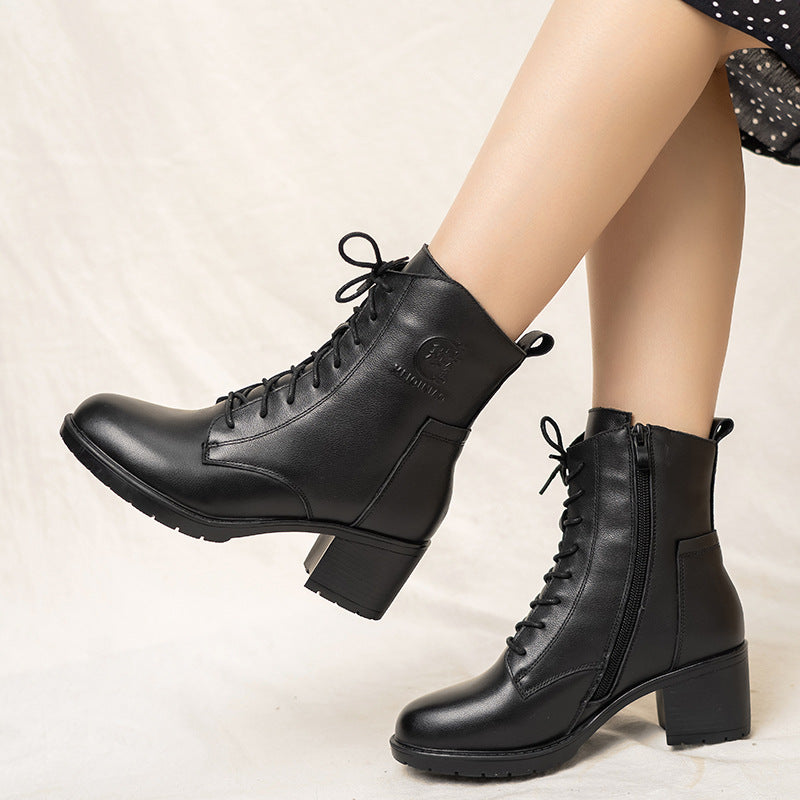 Autumn women's leather chunky heel ankle boots featuring a stylish design and sturdy heel.
