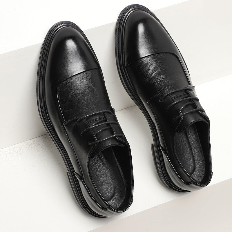Pointed British style business dress shoes featuring a sleek design and polished finish in black leather.