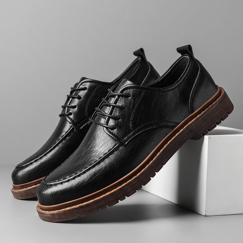 Lace-up breathable leather business shoes with a sleek design, perfect for professional attire.