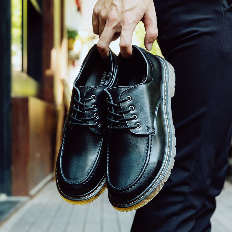 Stylish Top British leather shoes showcasing rich texture and classic design for versatile formal wear.