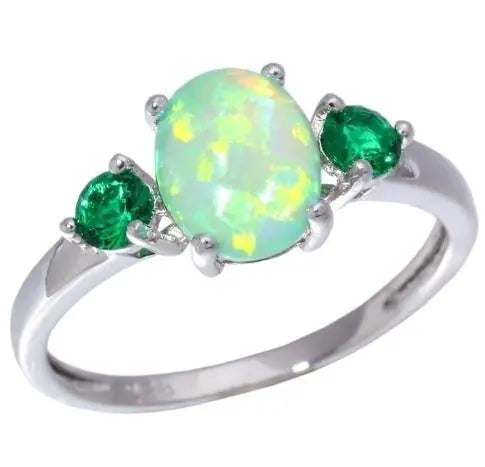 Opal Ring with Diamond and Emerald Accents