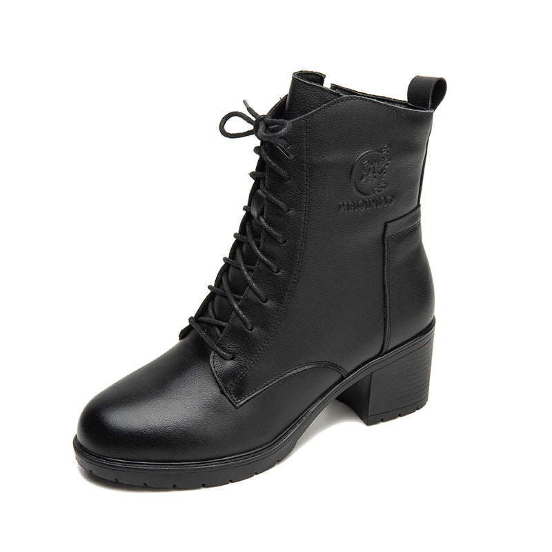 Autumn women's leather chunky heel ankle boots with a stylish design and sturdy heel, perfect for seasonal outfits.