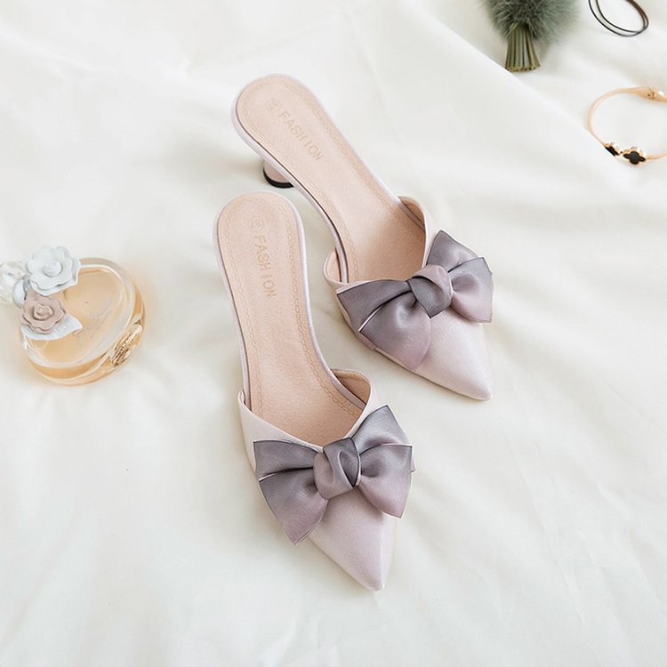 Pointed-toe bowknot high heel sandals for women in elegant design, showcasing stylish straps and a chic silhouette.