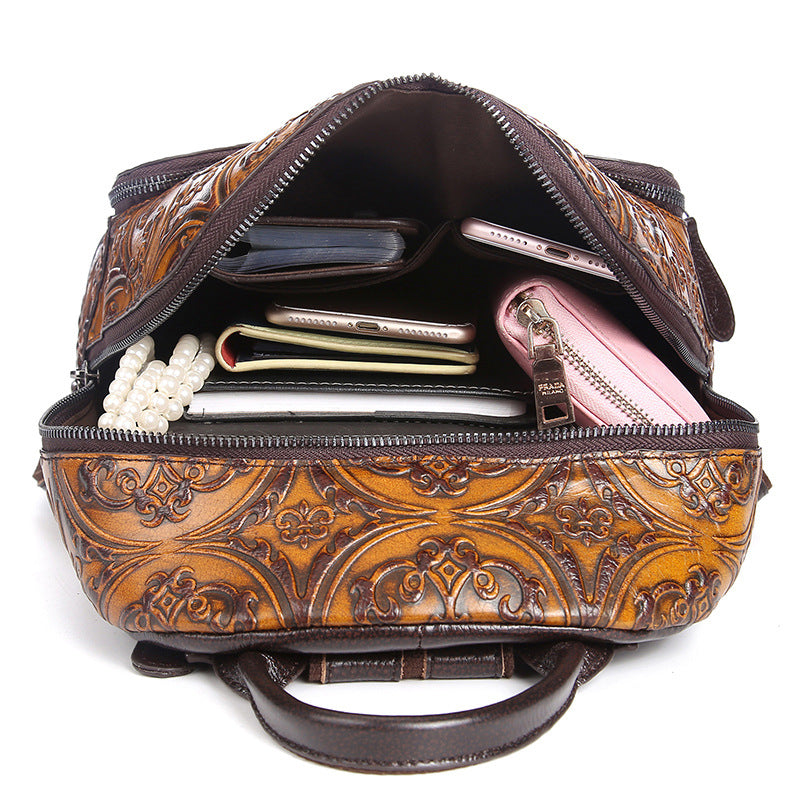 Luxury Retro genuine leather women's backpack bag with a stylish design and adjustable straps in a rich color.