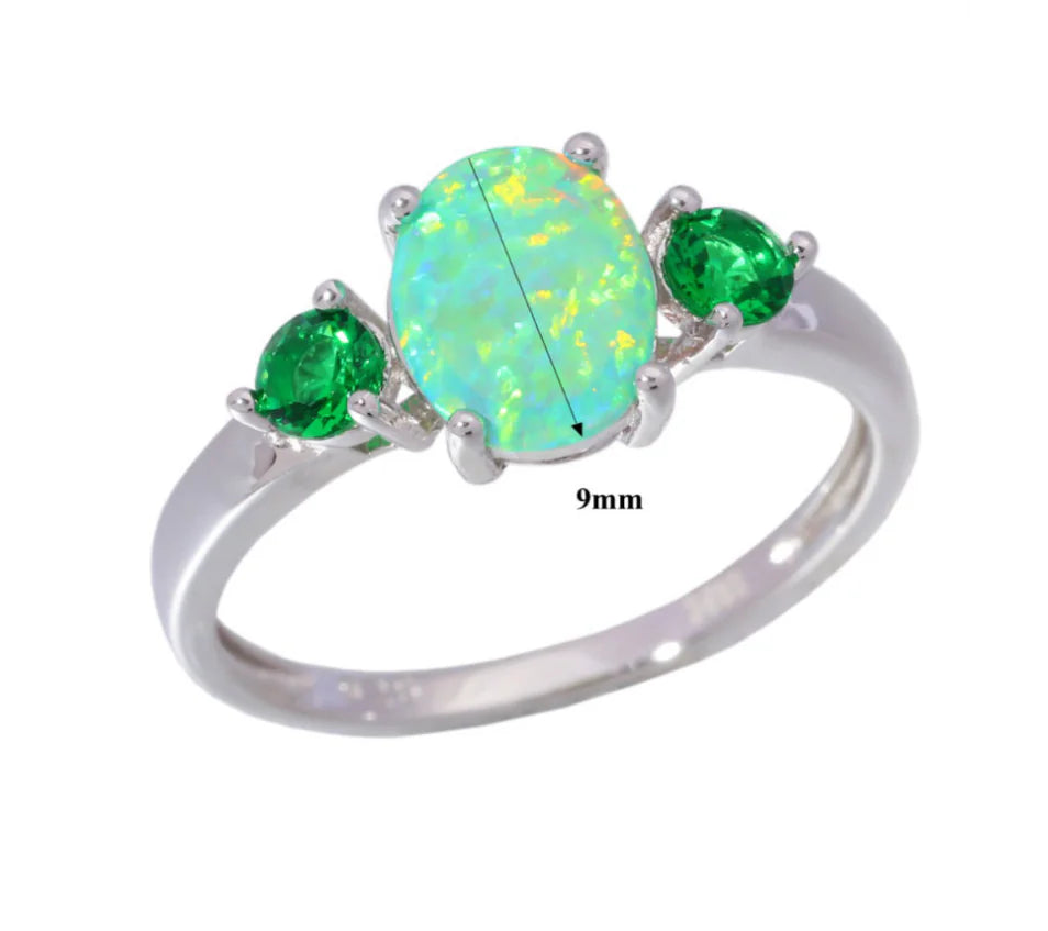Opal Ring with Diamond and Emerald Accents